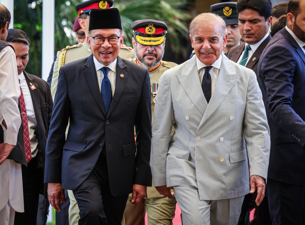 Prime Minister Datuk Seri Anwar Ibrahim and his Pakistani counterpart Shehbaz Sharif in conjunction with the state visit at the Pakistan Prime Minister Official Residence in Islamabad October 3, 2024. — Bernama pic