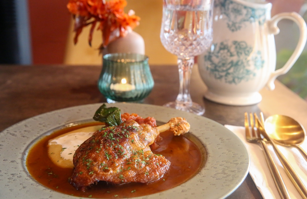 Classic Duck Leg Confit gets a little touch of Italian with stracciatella cheese and French potato mousseline — Picture by Choo Choy May