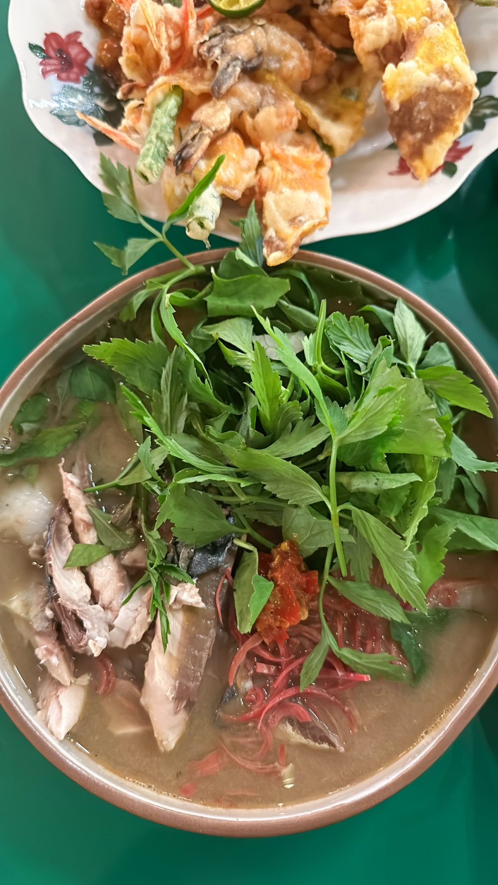 Laksam is a bowl of goodness with fish broth, ‘chee cheong fun’, fresh herbs and flaked fish — Picture by Lee Khang Yi