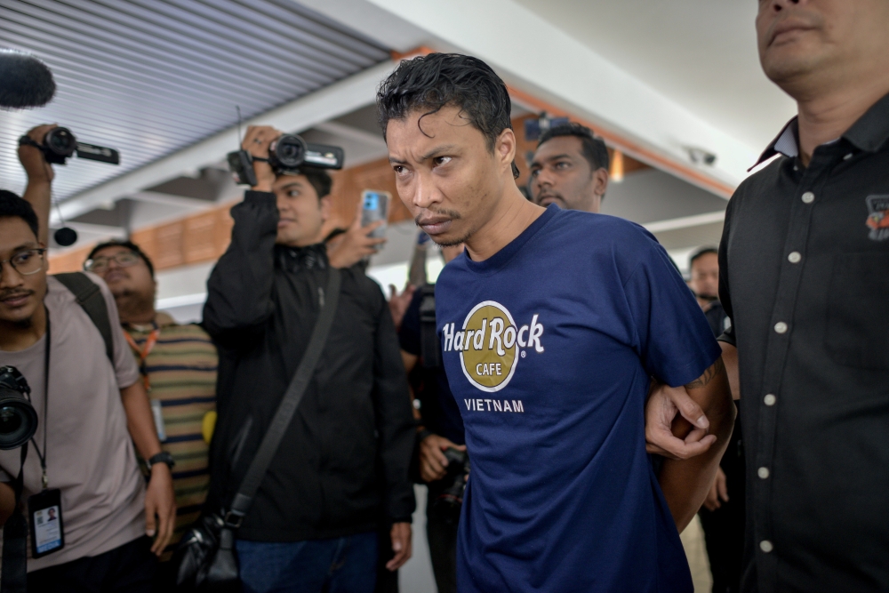 Caretaker to a GISB Holdings Sdn Bhd-linked welfare home Mohd Syahid Hanapiah arrives at court to be charged with abusing a six-year-old boy entrusted to his care by caning him at the Selayang Sessions Court October 4, 2024. — Bernama pic