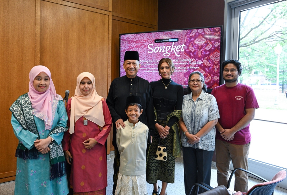 Ambassador Datuk Seri Nazri Aziz (back row, first left) poses with the curators and staff from the National Textile Museum of Malaysia, and the George Washington University Museum and The Textile Museum in the US. — Picture courtesy of the Malaysian Embassy in the US