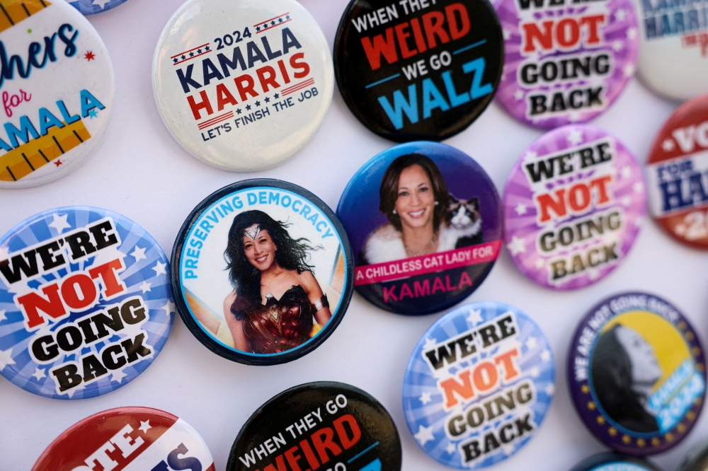 Buttons supporting Democratic presidential nominee and U.S. Vice President Kamala Harris in sale outside a campaign event, in Flint, Michigan October 4, 2024. — Reuters pic