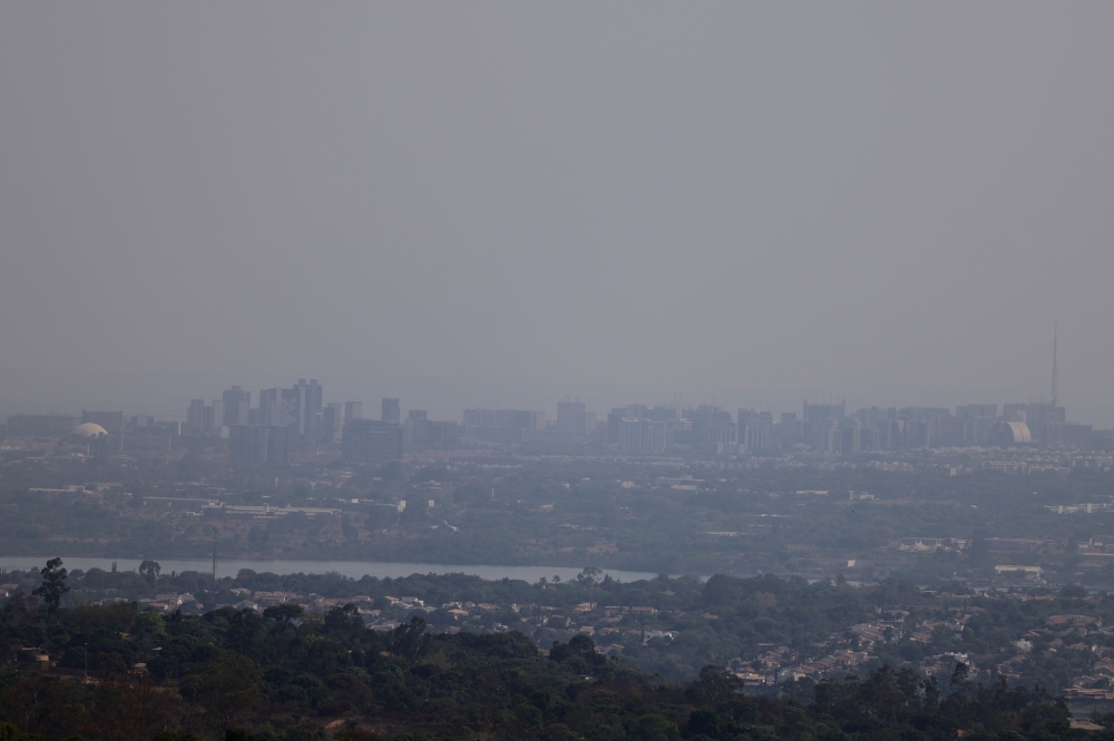 Smoke from wildfires covers part of Brasilia on the day the Brazilian capital broke the historic drought record set in 1963 by reaching 164 consecutive days without rain, according to the Meteorological Institute, in Brasilia, Brazil October 4, 2024. — Reuters pic  