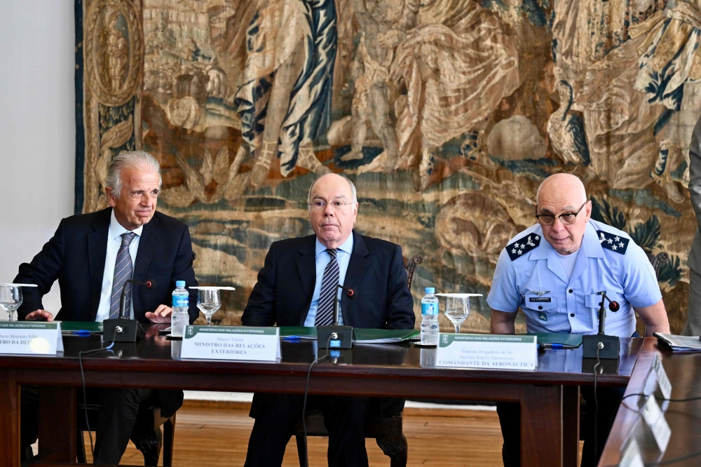 (From left) Brazilian Defense Minister José Múcio, Foreign Minister Mauro Vieira and Air Force Commander Brigadier Kanitz Damasceno gesture during a meeting to plan the repatriation of Brazilians in Lebanon in Brasilia October 3, 2024. — AFP pic