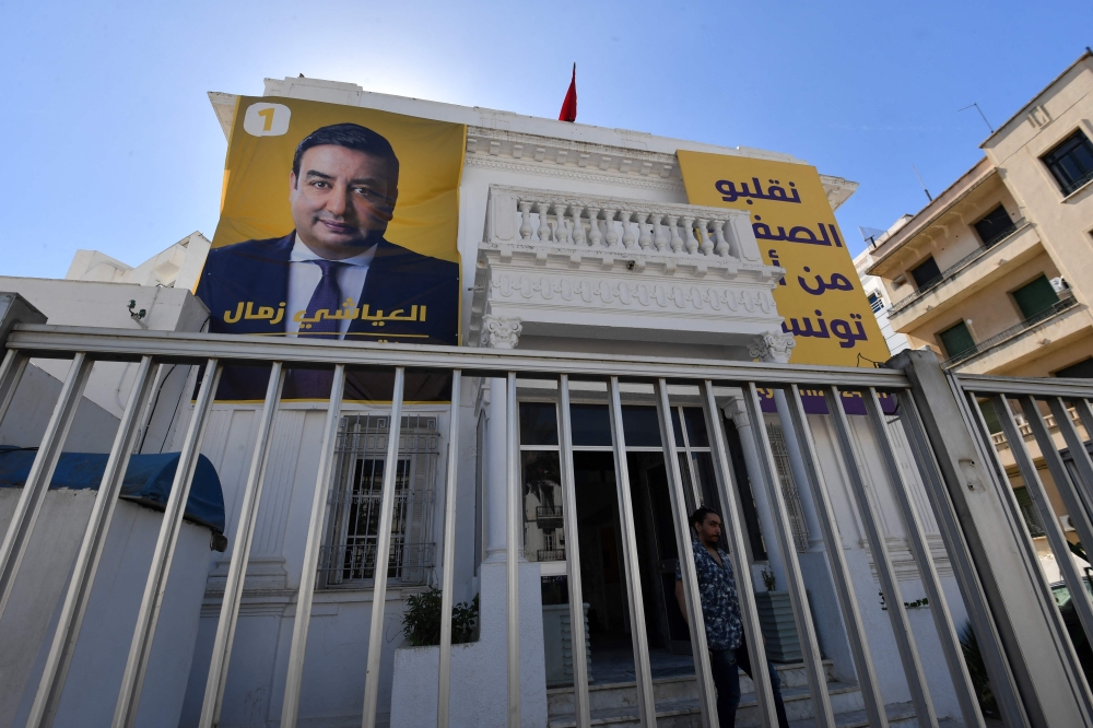 A poster of imprisoned presidential candidate Ayachi Zammel is displayed at the entrance of his electoral headquarters on October on October 4, 2024. Tunisians will head to the polls on October 6 for a presidential election in which analysts say incumbent Kais Saied is poised for victory with his most prominent critics behind bars. — AFP pic