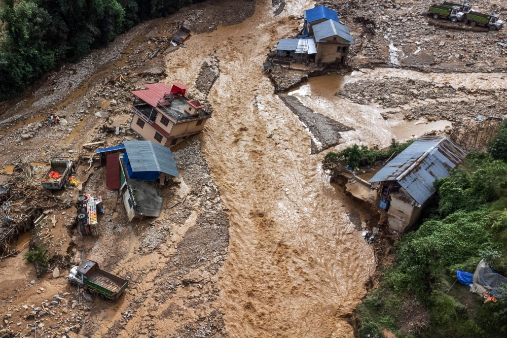 An aerial view shows the area affected by monsoon flooding in Roshi village of Nepal's Kavre district on September 30, 2024. — AFP pic