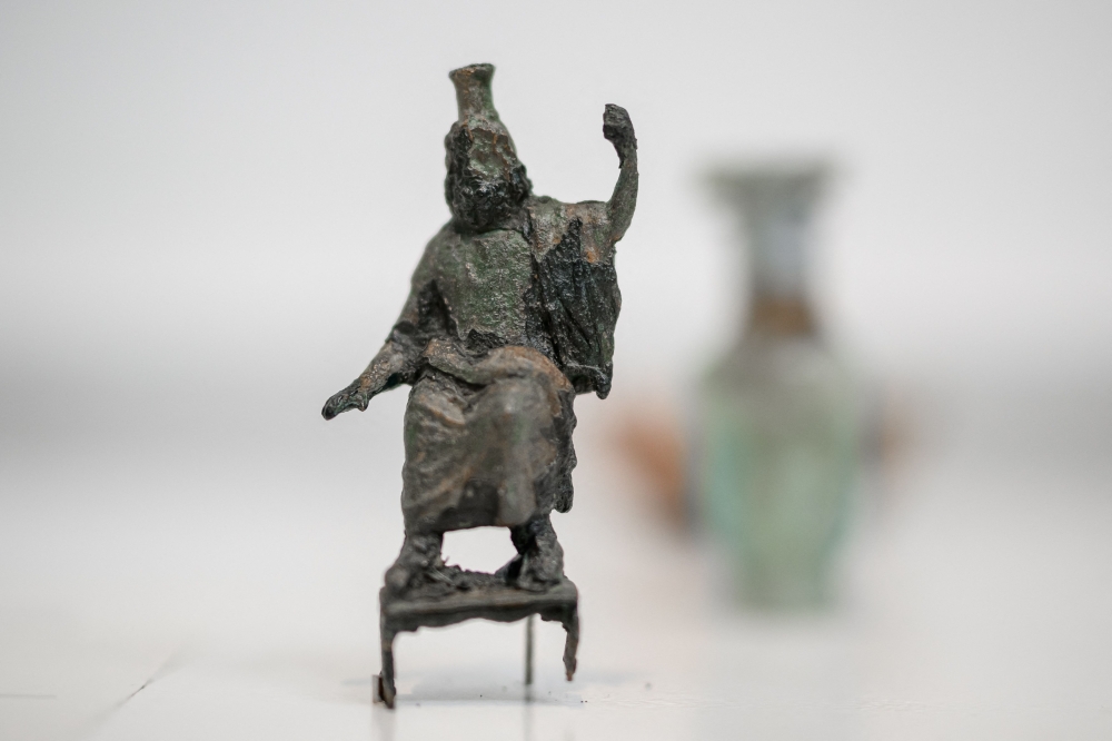 This photograph shows a bronze figurine of Serapis (Roman period, 2nd Century, underwater discovery, 2004) during an exhibition on protection of cultural property in case of conflict entitled 