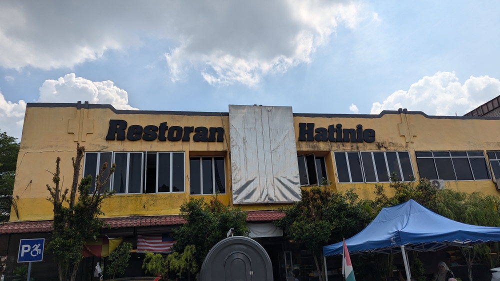 It’s impossible to miss the shop’s sign.  — Picture by Ethan Lau