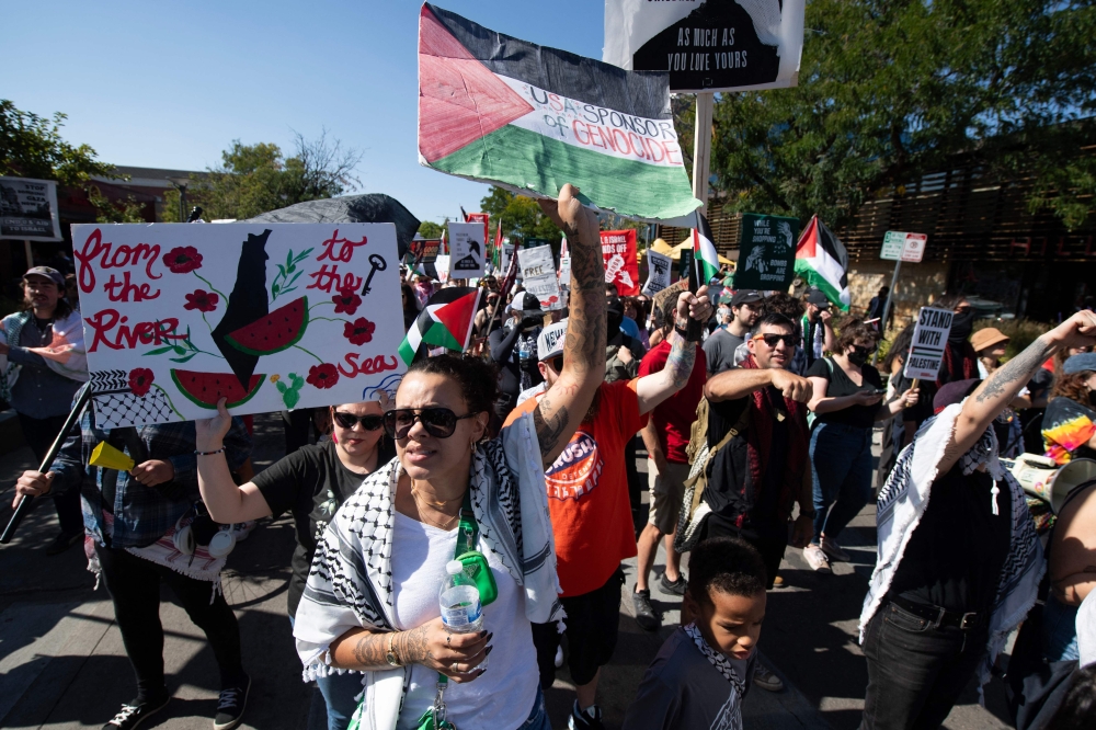 Demonstrators march in support of Palestinians during a protest against the war in Gaza, in Denver, Colorado October 5, 2024. — AFP pic