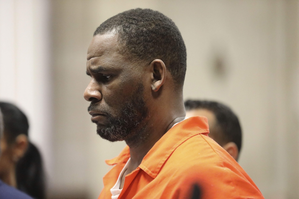 Singer R. Kelly appears during a hearing at the Leighton Criminal Courthouse on September 17, 2019 in Chicago. The music industry has long evaded a #MeToo reckoning like that experienced in Hollywood or the media, but the blockbuster charges against hip hop magnate Sean Combs could finally prove an inflection point. — Antonio Perez/Pool/AFP pic 