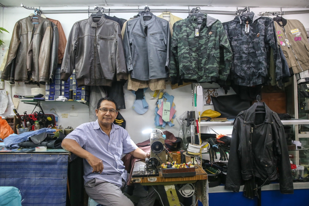 Tailor Abasilah poses for a photograph at his store at Pertama Complex in Kuala Lumpur on October 2, 2024. — Picture by Yusof Mat Isa