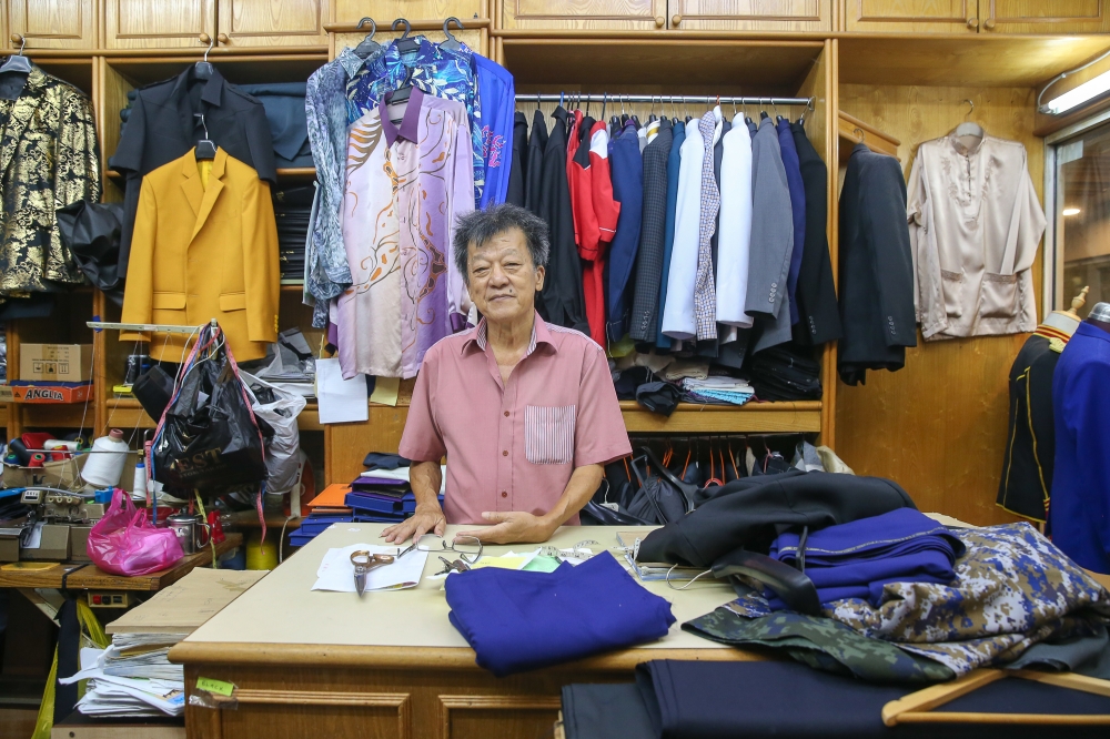 Tailor Richard Yap poses in his store at Campbell Shopping Complex in Kuala Lumpur on October 2, 2024. — Picture by Yusof Mat Isa