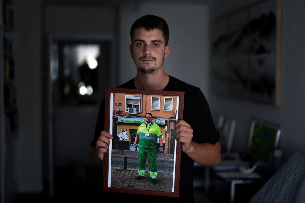 Miguel Angel said that a few days before his father died, he crossed paths with him on the train as Gonzalez was coming home and 'he told me it was hard for him to talk because of the heat he was feeling'. — AFP pic