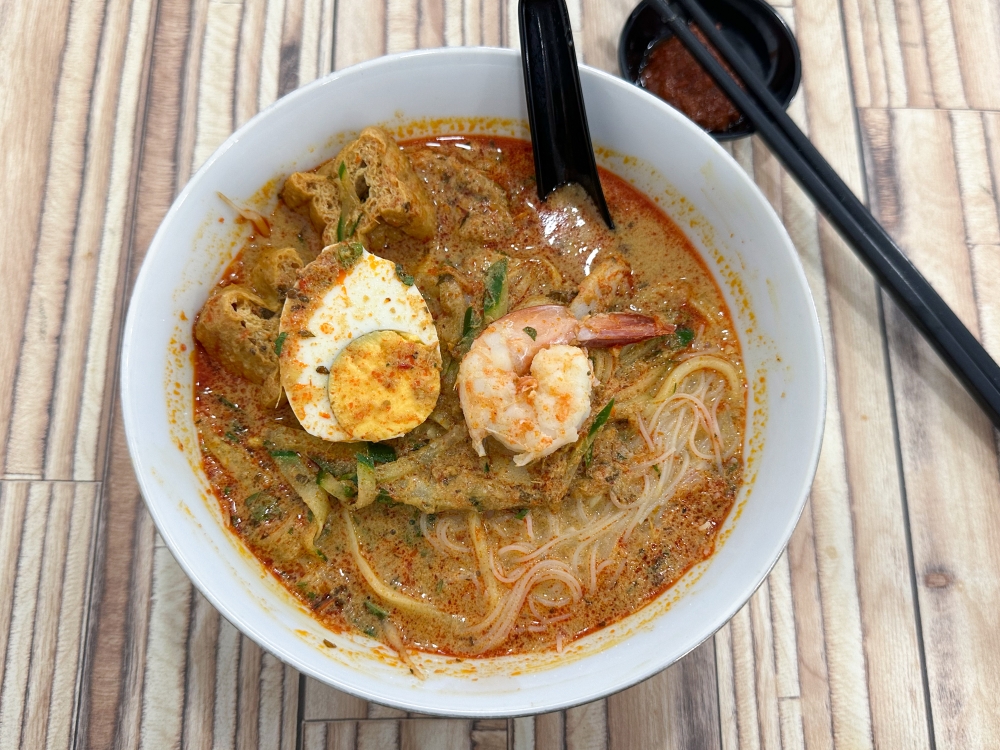 Nonya 'laksa' is a great rendition of the Melaka version with creamy, fragrant broth that you will want to slurp down to the last drop. — Pictures by Lee Khang Yi