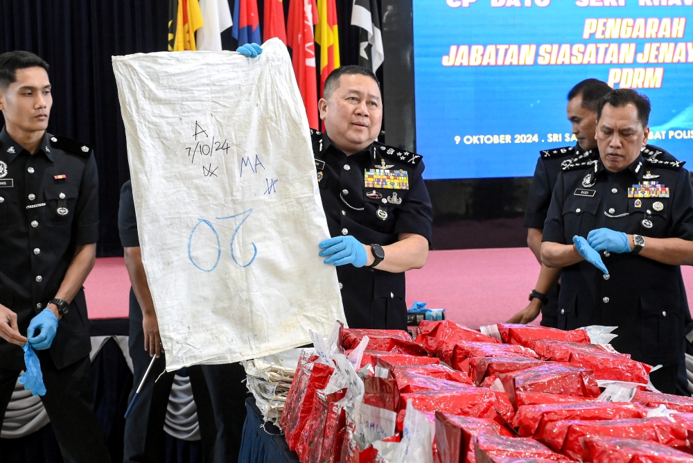 Luxury condos, Chinese temples and dead owners’ vehicles as modus operandi: Cops bust three drug rings in KL and Muar, seize over RM24m worth of narcotics