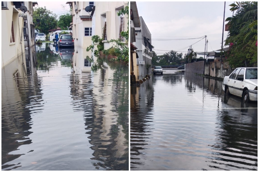 Pandamaran and Taman Sentosa were particularly hard hit, with several households in ankle-deep water. — Picture by Joe Lee