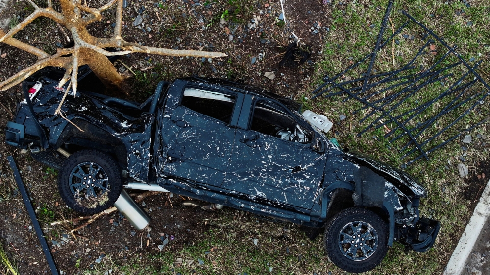 A drone view shows a Chevrolet pickup truck overturned by a tornado in a zone affected by Hurricane Milton, in Palm Beach Gardens, Florida. — Reuters pic