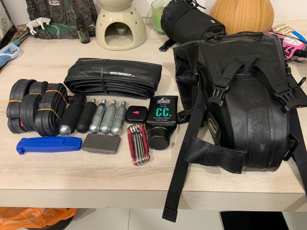 Things that go into the saddle bag: tubes, CO2 inflators, tyre lever, spare tyre, tyre-patch/plug, multi-tool, chamois cream. — Picture courtesy of Fazrul Farouk