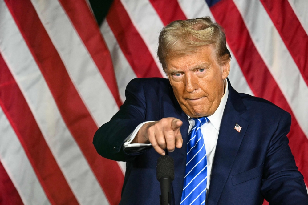 Former US President and Republican presidential candidate Donald Trump speaks during a campaign event at Discovery World in Milwaukee, Wisconsin October 1. — AFP pic