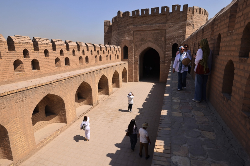 This picture taken on September 10, 2024 shows a view of Bab al-Wastani (Central Gate), also known as Bab Khorasan (Khorasan Gate), the only remaining gate of the old city walls of Baghdad, built in the 12th century between the reigns of the 28th Abbasid caliph al-Mustazhir and his son and successor al-Mustarshid, and which has undergone restoration in the 20th century. — AFP pic