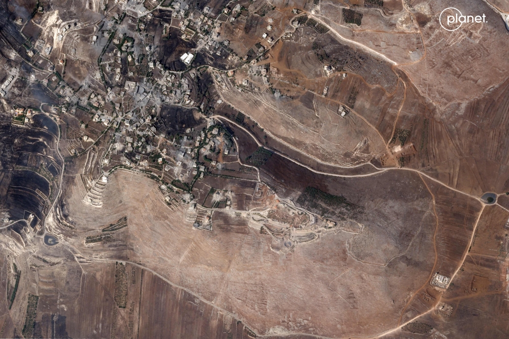 This handout satellite picture provided by Planet Labs PBC and dated on October 5, 2024, shows Lebanon’s southern Maroun El Ras village near the border with Israel, and a Unifil peacekeeper’s base (bottom right) with military vehicles in its vicinity amid the ongoing war between Israel and Hezbollah fighters. On October 6, Unifil warned that Israeli operations near their Maroun al-Ras position were ‘extremely dangerous’ and compromised their safety, a day after the force said peacekeepers remained in their positions despite an Israeli request to ‘relocate’. — Planet Labs PBC/AFP pic