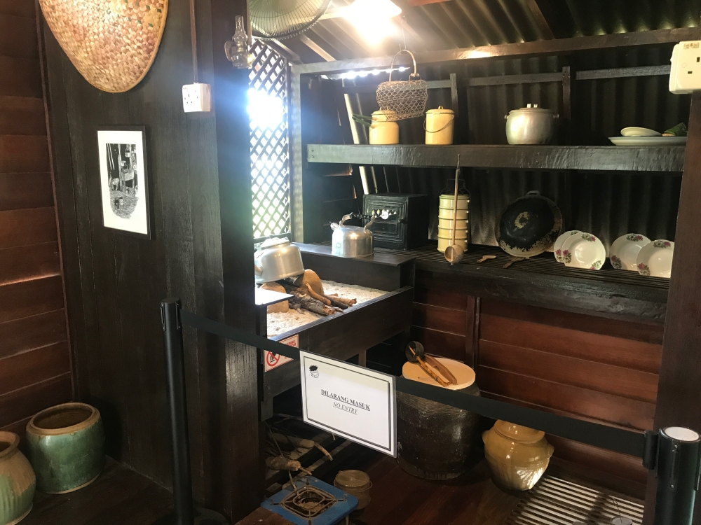 The kitchen inside the Limas House replicates the one of the home where Lat and his four siblings grew up, which he immortalised in his ‘Kampung Boy’ drawings. — Picture by John Bunyan