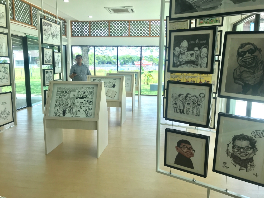 Lat’s Homage section in the Rumah Galeri Lat displays various sketches by other artists in his honour. — Picture by John Bunyan