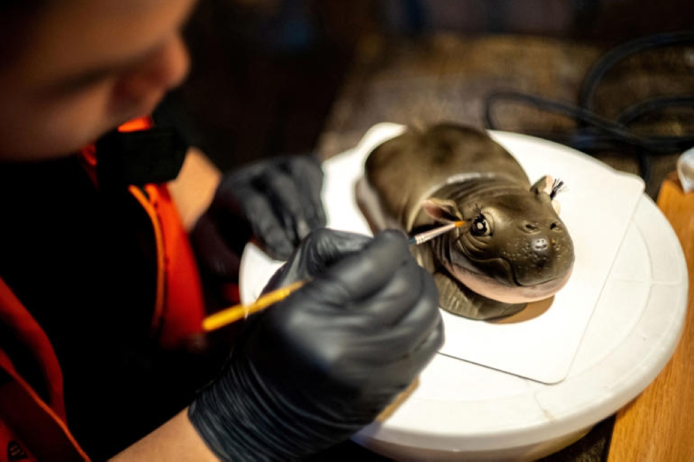 Moo Deng cakes at Bangkok’s Vetmon Cafe are handcrafted. — Picture from Reuters