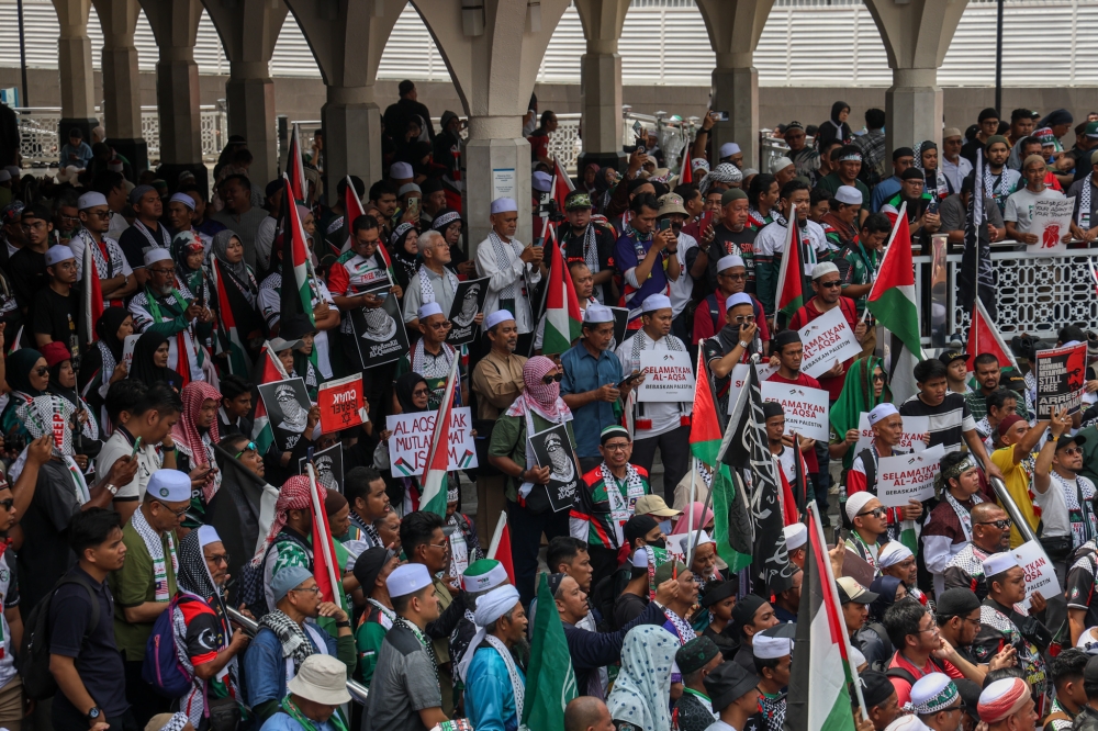 Pro-Palestinian demonstrators gather in support of the Palestinian people during a rally to mark the first anniversary of Al-Aqsa storm in Kuala Lumpur on October 12, 2024. — Picture by Firdaus Latif