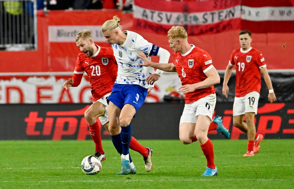 Norway’s Erling Haaland in action with Austria’s Nicolas Seiwald and Konrad Laimer during their UEFA Nations League, League B Group B3 match in Linz October 13, 2024. — Reuters pic