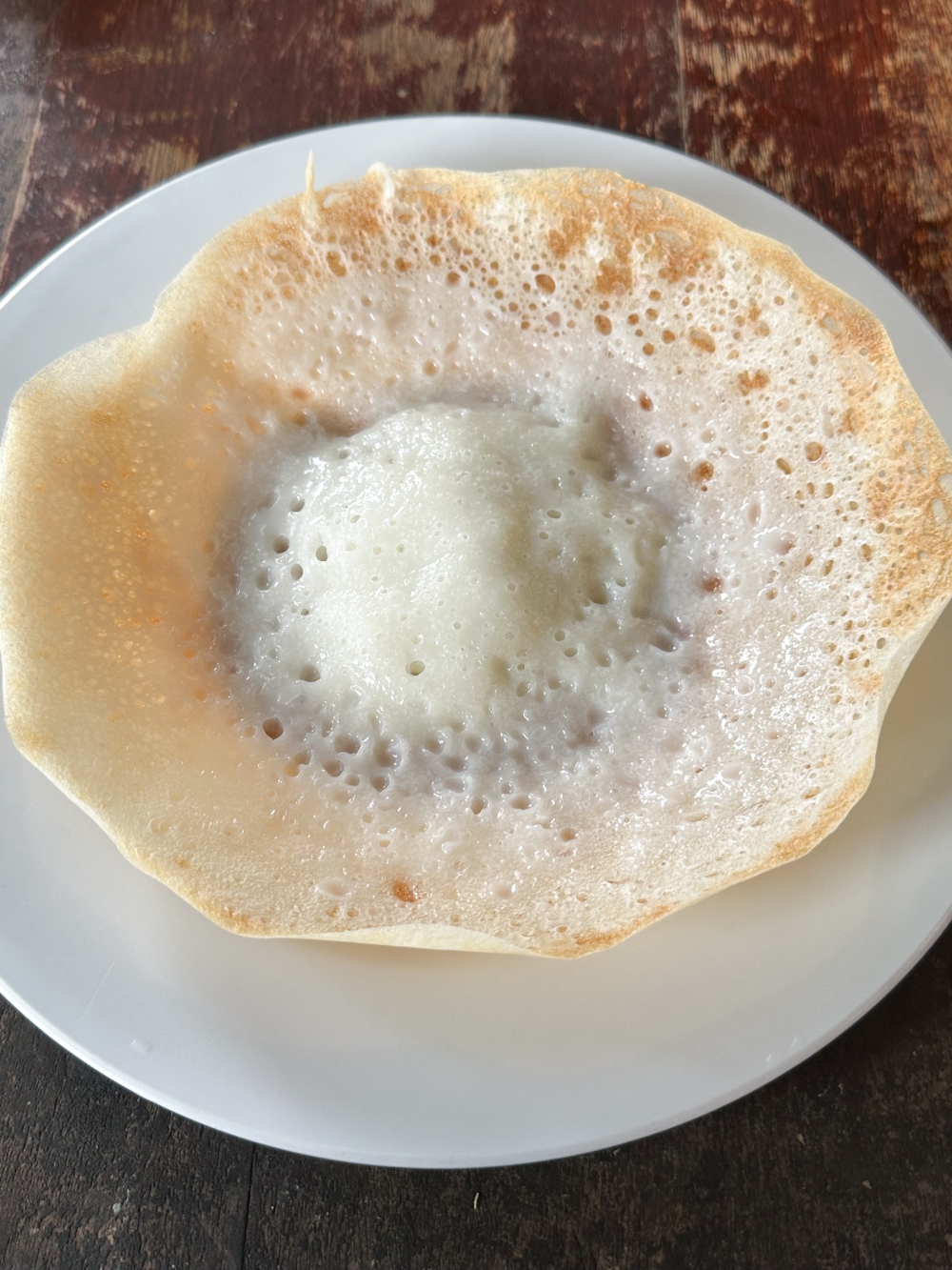 ‘Appam’ can be made to order and served drenched in a ladle of fresh coconut milk. — Pictures by Lee Khang Yi