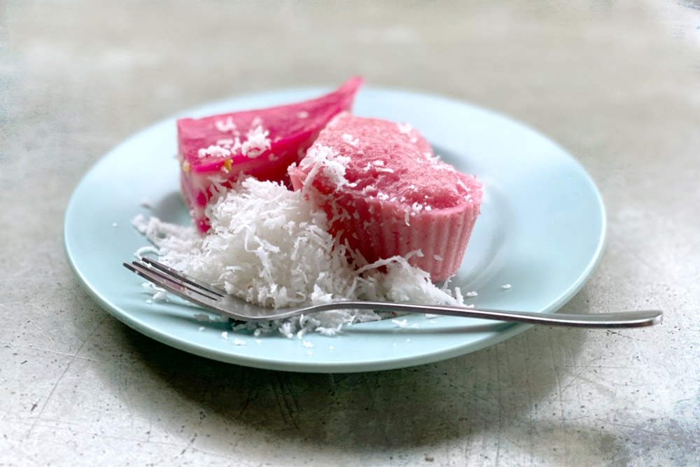 Rose-coloured ‘kuih lapis’ and ‘kuih apam’. — Picture by CK Lim