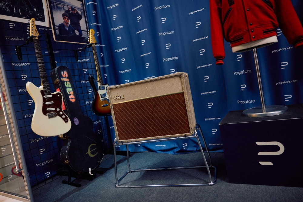 John Lennon's first ever Vox amp, 1962 Fawn JMI Vox AC15 Twin Amp and Oasis' Noel Gallagher owned and autographed first Cream Hohner JT60 guitar, items that will go under the hammer on November 15 during the Propstore auction, taken during a preview in central London October 1, 2024. — AFP pic