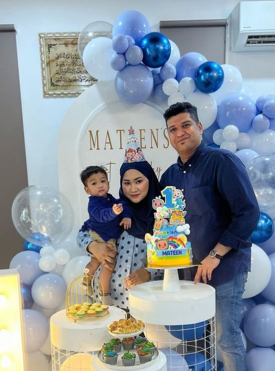 Eyda Sybney poses with her husband and child, which she conceived after stopping IVF treatment. — Picture courtesy of Eyda Sybney