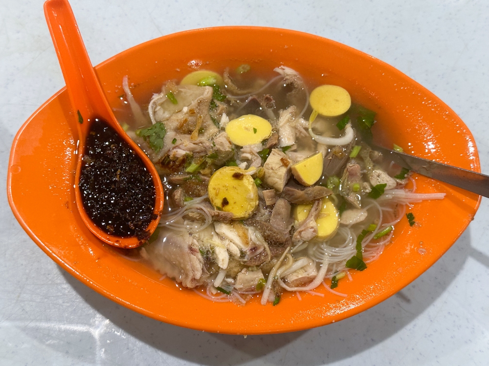 Pak Chat Soto has made a name for themselves for that flavourful broth using old hens, herbs and spices. — Picture by Lee Khang Yi