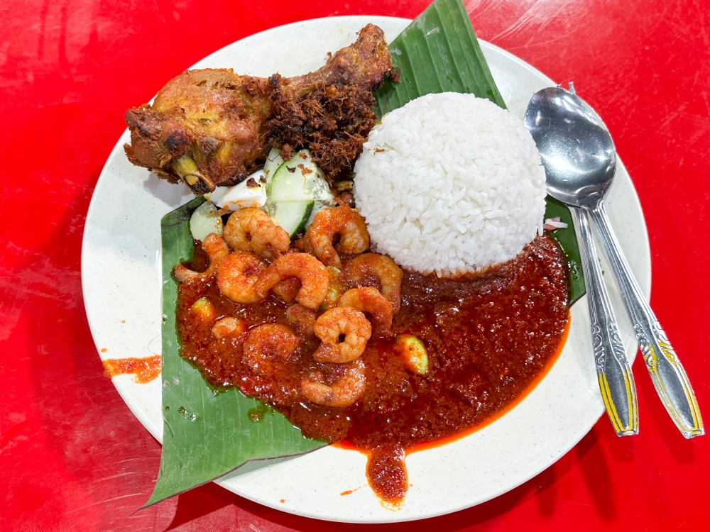 Nasi Lemak Sambal Udang is one of the items worth queueing up for at the Original Nasi Lemak Pekan Sungai Besi stall. — Picture by Lee Khang Yi