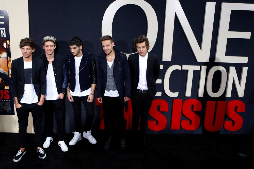 File photo of (from left) Louis Tomlinson, Niall Horan, Zayn Malik, Liam Payne and Harry Styles of British boy band One Direction at the premiere of their documentary film 