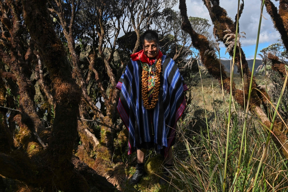 Indigenous authority of the Inga ethnic group Taita Florentino Chazoy poses for a picture at the Green Lake, in Tuquerres, department of Narino, Colombia on August 29, 2024. — AFP pic