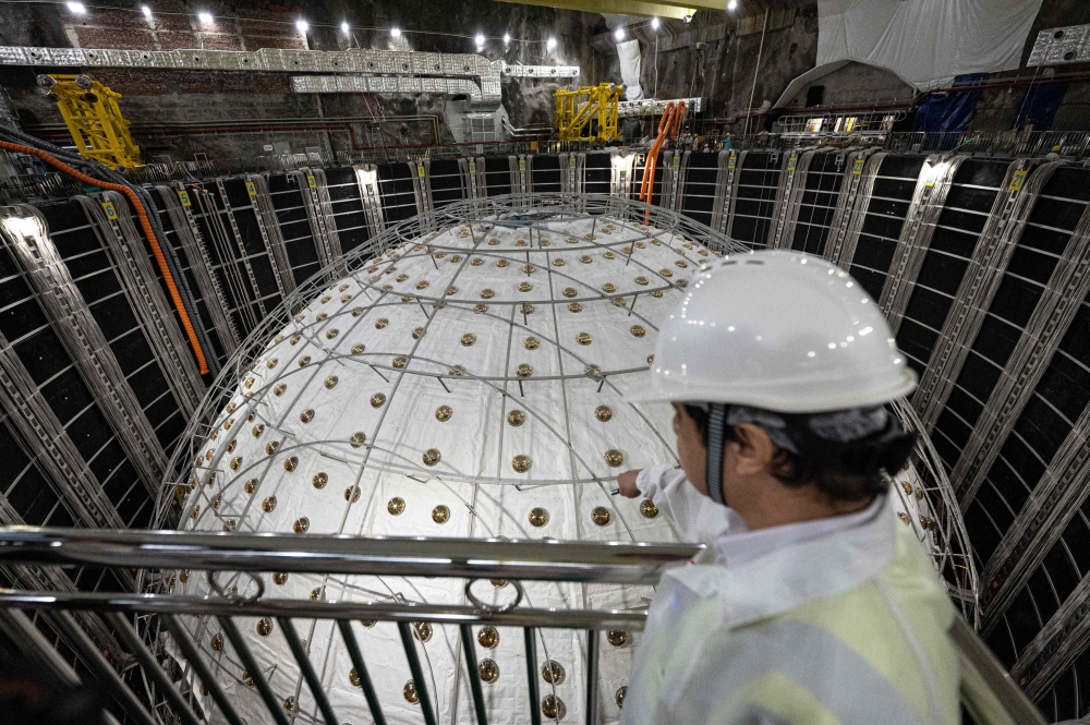 Around 750 scientists from 17 countries are taking part in Jiangmen Underground Neutrino Observatory, including “two American groups”. — AFP pic