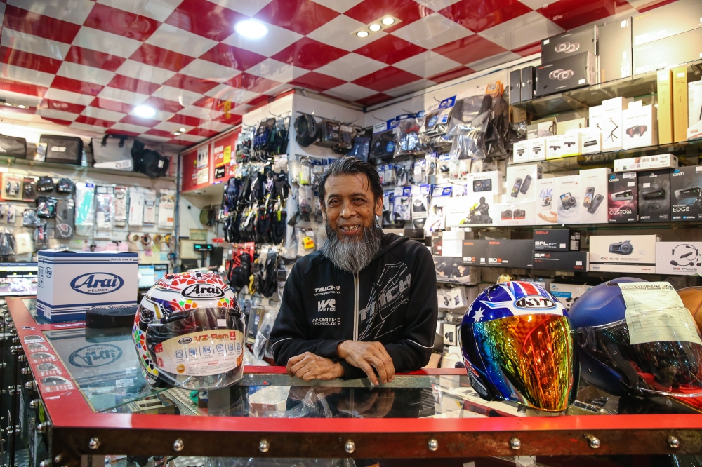 Mohd Bakri Che Din poses for a photograph in his store at Pertama Complex in Kuala Lumpur on October 15, 2024. — Picture by Yusof Mat Isa