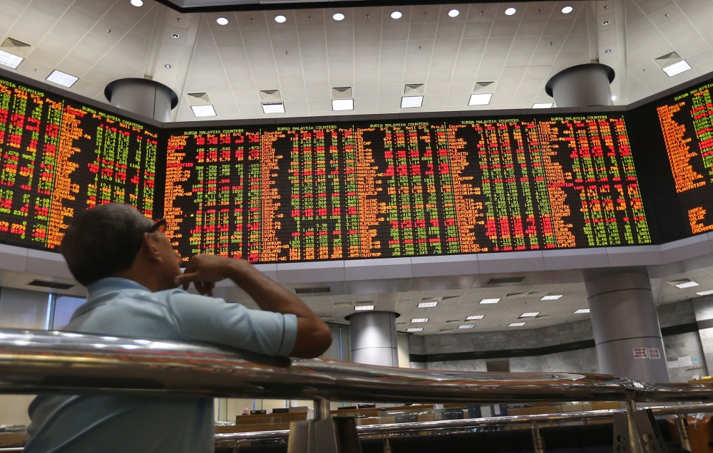 A file photograph of stock counters being shown on an electronic display at the Bursa Malaysia in Kuala Lumpur. —  Picture by Razak Ghazali