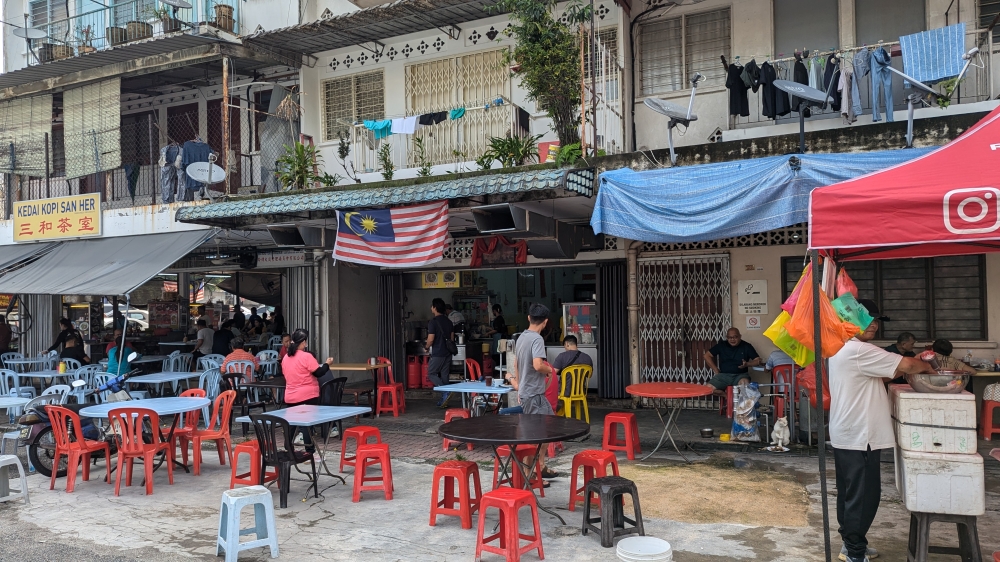 It can be hard to spot Sun Fatt’s small sign, so just look for the shop next to the larger and more popular Kedai Kopi San Her. — Picture by Ethan Lau