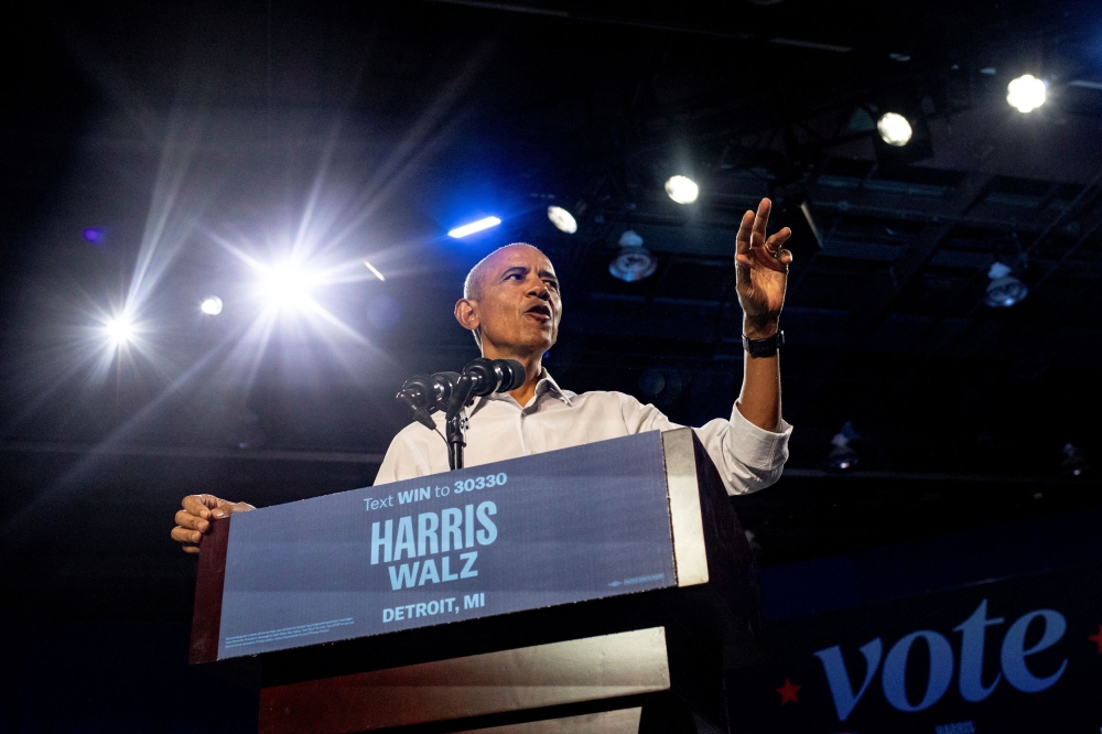 Former U.S. President Barack Obama speaks to the crowd during a campaign event for Democratic presidential nominee and U.S. Vice President Kamala Harris, during the first week of early voting in Detroit, Michigan, U.S. October 22, 2024. — Reuters pic