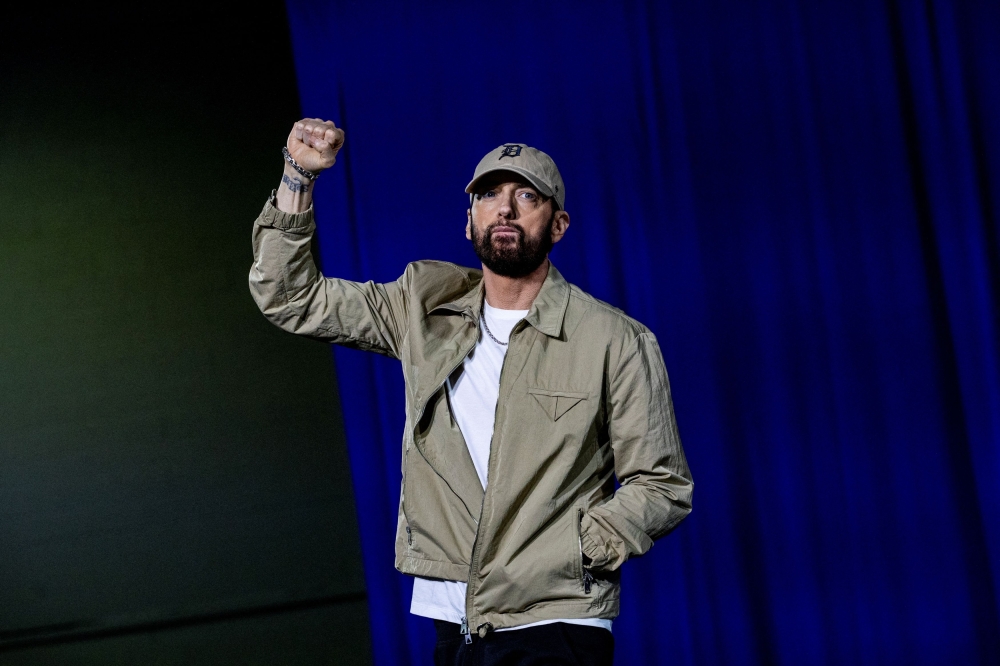 Eminem takes the stage to introduce former U.S. President Barack Obama during a campaign event for Democratic presidential nominee and U.S. Vice President Kamala Harris, during the first week of early voting in Detroit, Michigan, U.S. October 22, 2024. — Reuters pic