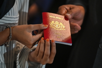 Sir, you can bring that in here: Man with dog was trying to renew passport in PKNS mall