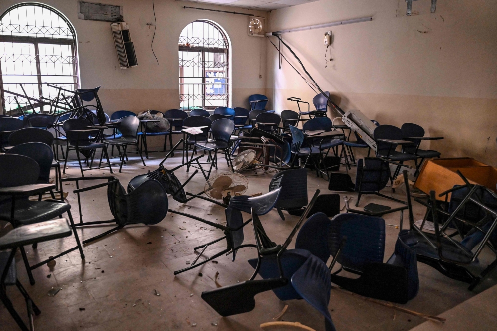 In this photograph taken on October 16, 2024, a vandalised classroom is pictured after a protest following the alleged rape of a woman student, in Lahore. — AFP pic