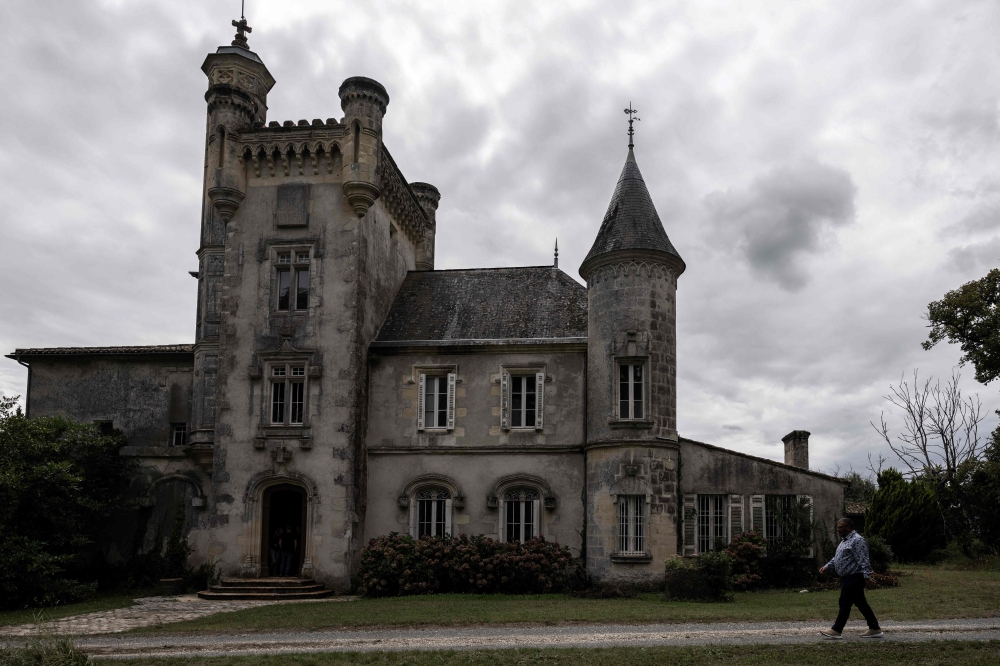 This photograph shows the Chateau Latour Laguens, which was one of the first wine estates in France’s leading AOC vineyard, the Bordeaux wine-growing region, to be bought by a Chinese company in 2008, now to be sold by auction, in Saint-Martin-du-Puy, southwest France, on September 5, 2024. — AFP pic