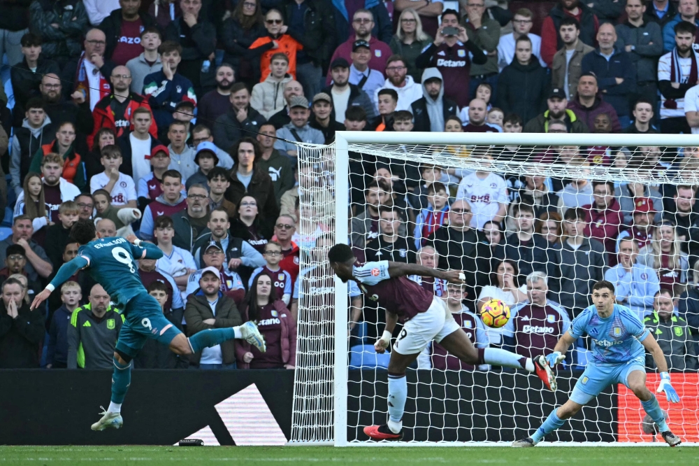 Bournemouth’s Evanilson heads home their late first goal during the English Premier League match with Aston Villa at Villa Park in Birmingham October 26, 2024. — AFP pic