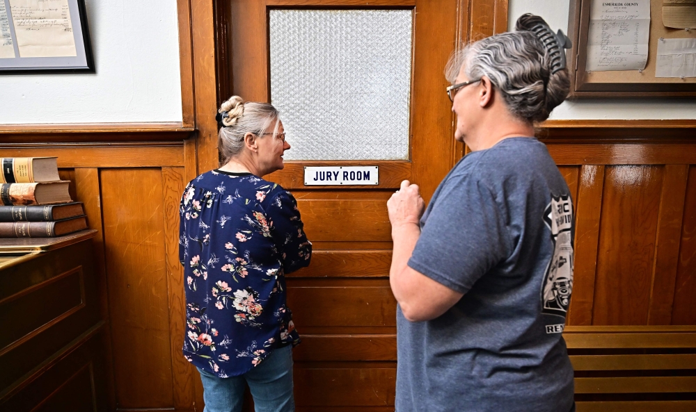 Esmeralda County clerk Cindy Elgan (left) and deputy clerk Lori Baird stand at the doorway to where ballots are kept in the historic Esmeralda County courthouse in Goldfield, Nevada October 17, 2024, in the state's least populous county. Across the swing state of Nevada, several election officials have quit their job after suffering harrassment resulting from conspiracy theories and death threats following the 2020 Presidential elections. — AFP pic