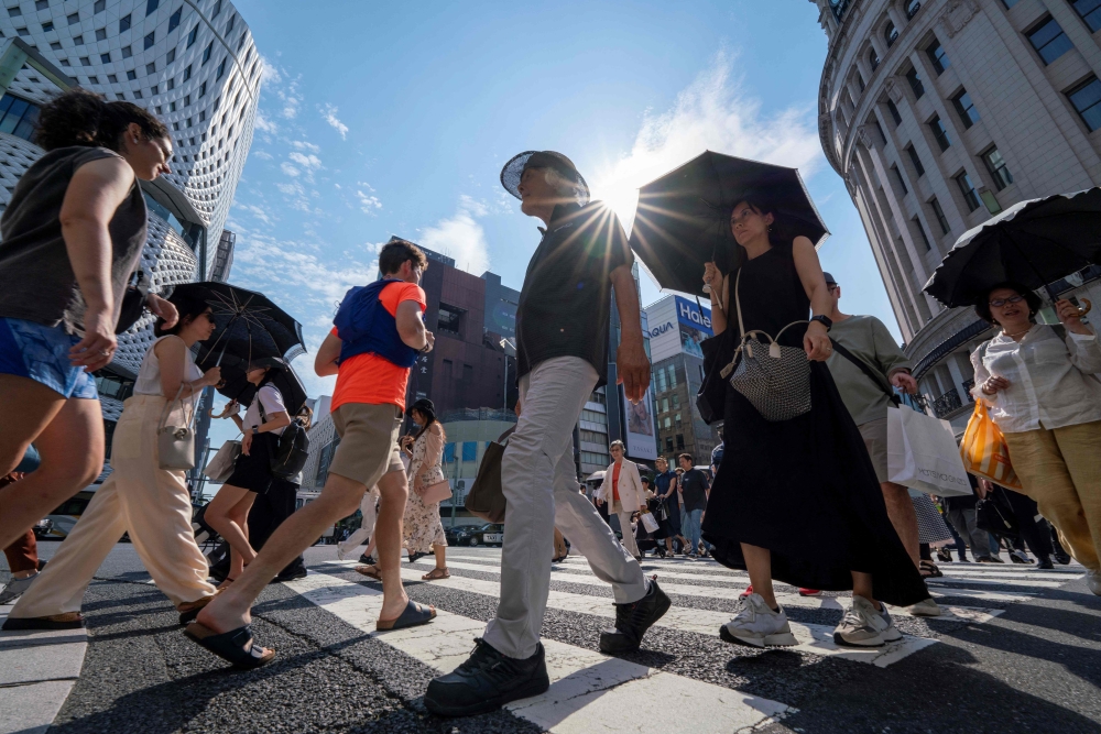 Starting in the fourth quarter of 2025, Singapore’s Land Transport Authority will replace its 11,500 mechanical pedestrian push buttons with touchless microwave sensors. — AFP pic